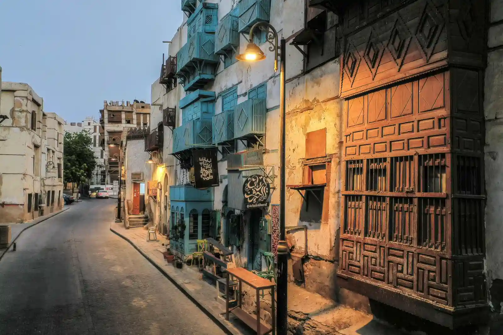 Historic Al-Balad street with traditional rawasheen wooden balconies in old Jeddah