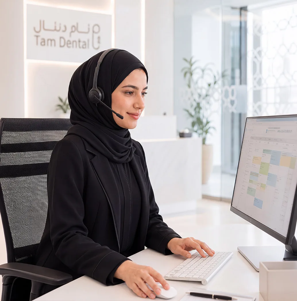 Tam Dental coordinator taking an online consultation booking at the Jeddah clinic